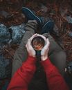 Person Holding Clear Glass Cup