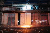 Brown Concrete Building during Night Time