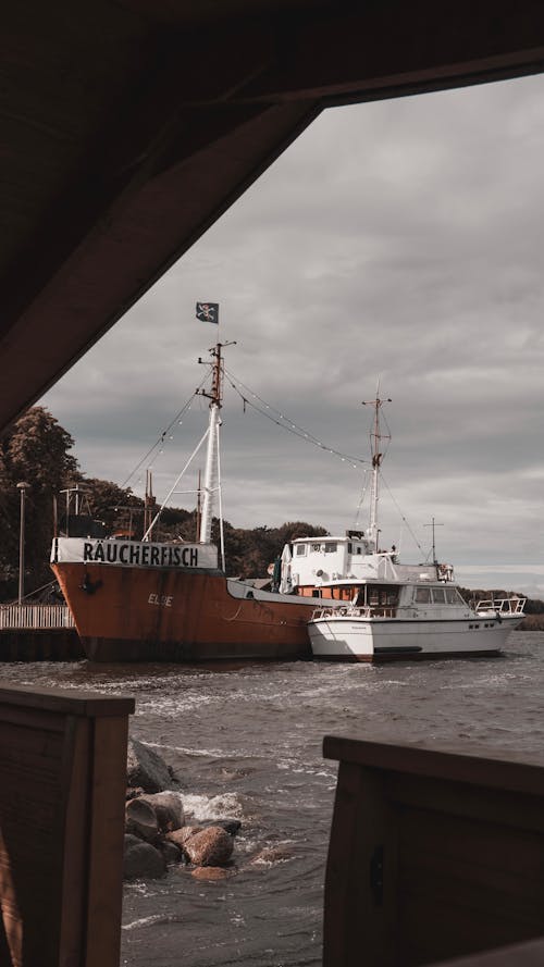 Red and White Boat on Sea Dock