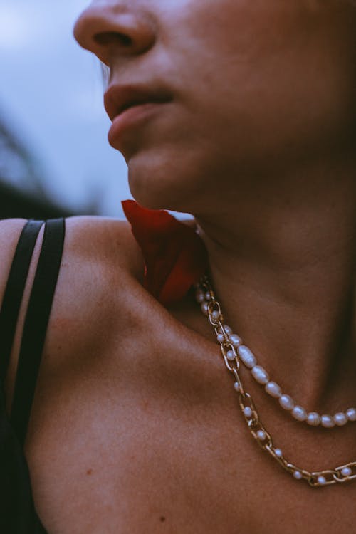 Free A Woman Wearing Necklaces Stock Photo