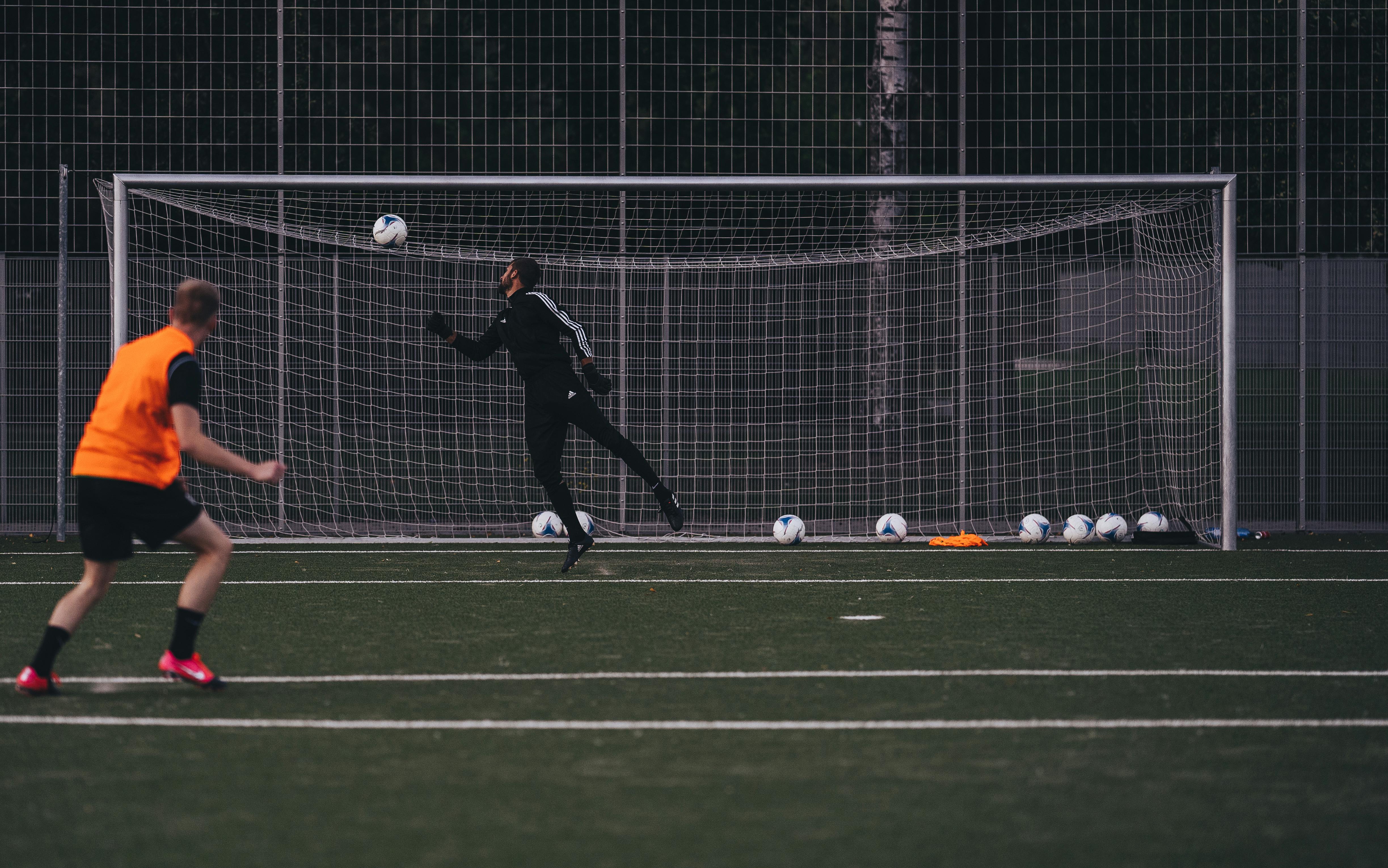 photograph of a goalkeeper playing football