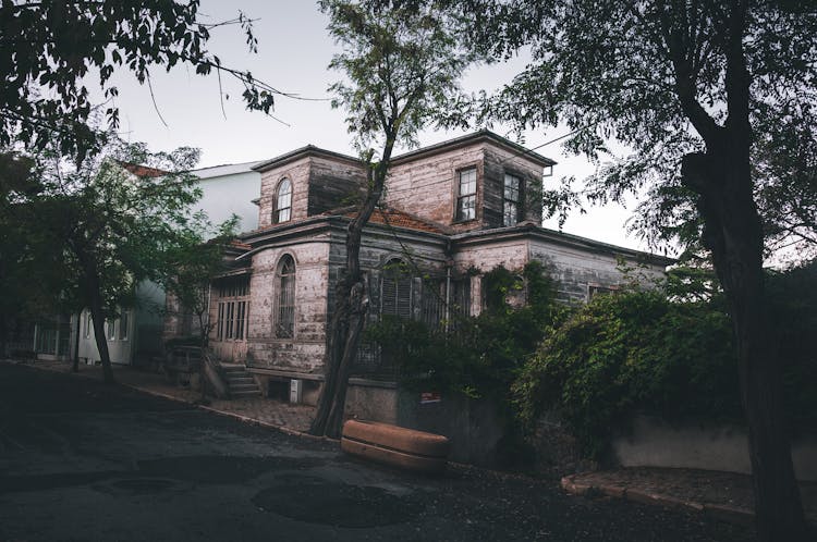 An Abandoned Building In A Town