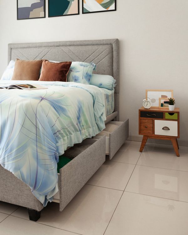 Bed with pull-out storage drawers for hidden organization