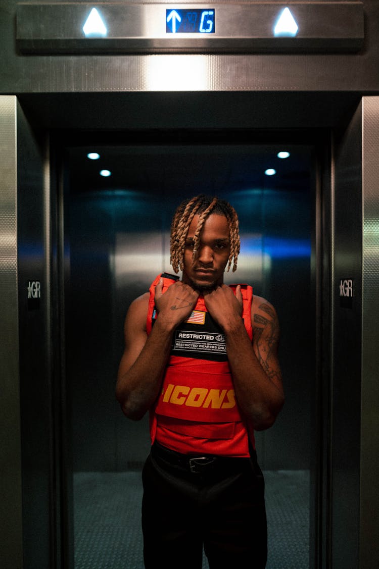 Man Posing In Elevator