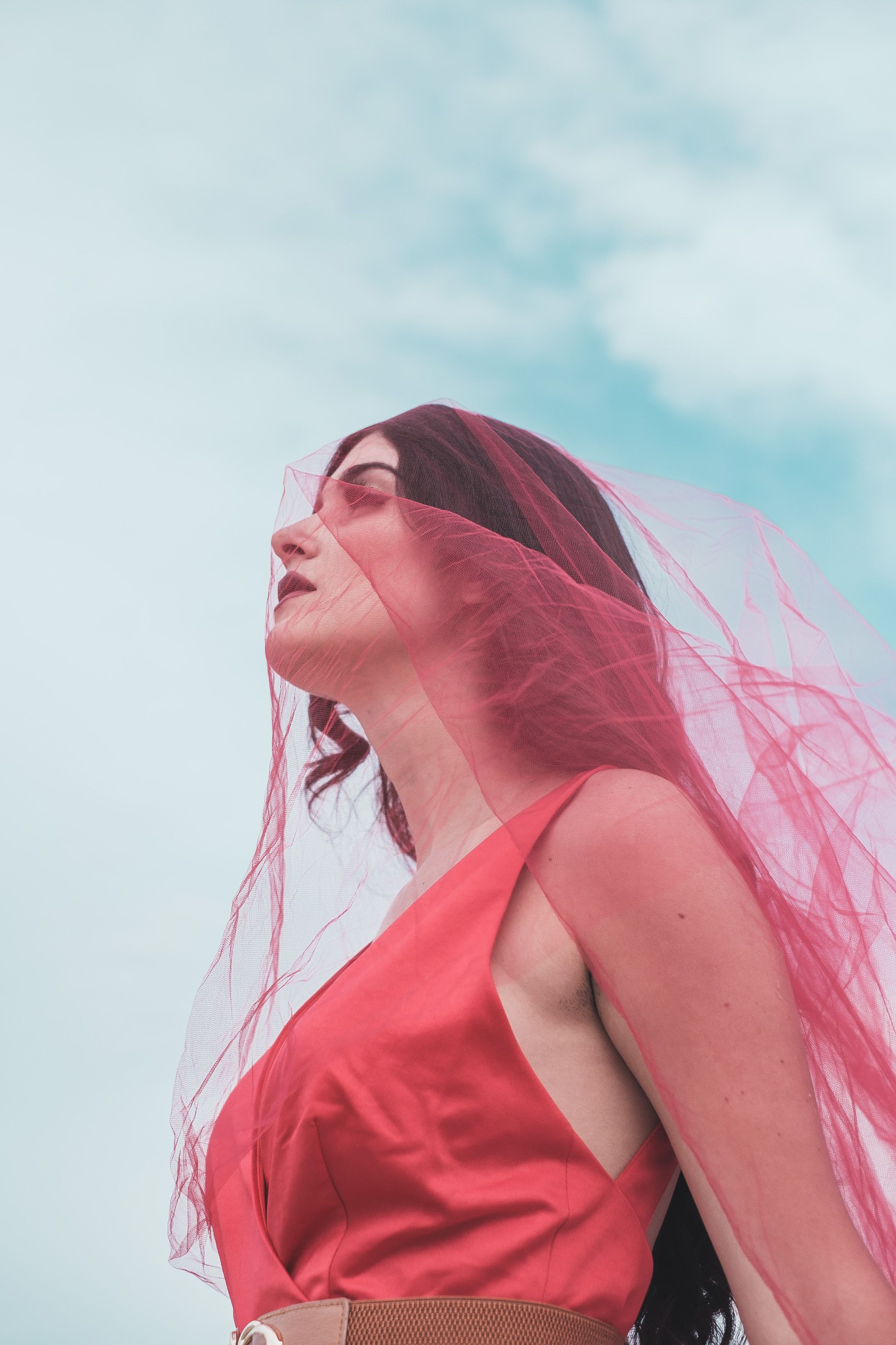 Woman Standing in Red Dress and Veil · Free Stock Photo