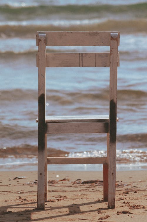 A Wooden Chair on the Beach