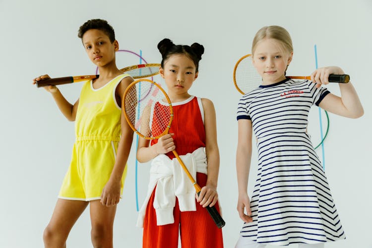 Girls Holding Rackets