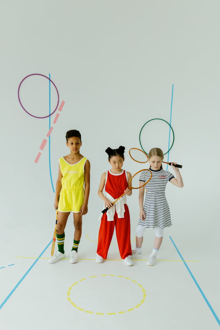 Photo Of Girls Holding Rackets