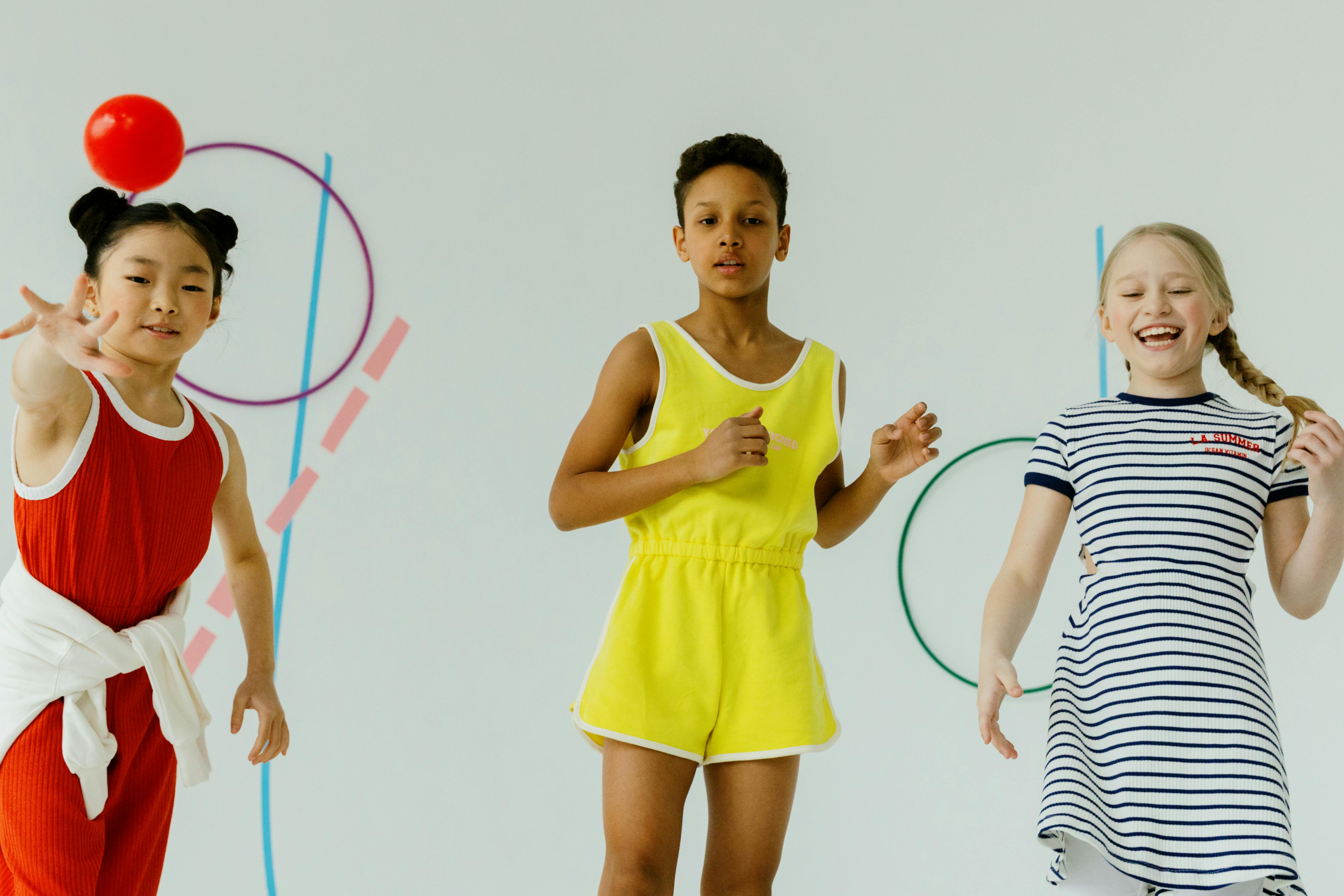 Three Girls Smiling while Standing Next to Each Other · Free Stock Photo