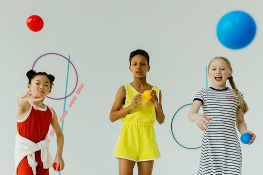 Three diverse children playing with colorful balls in a playful indoor setting.