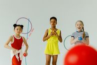 Girls Looking at the Red Ball