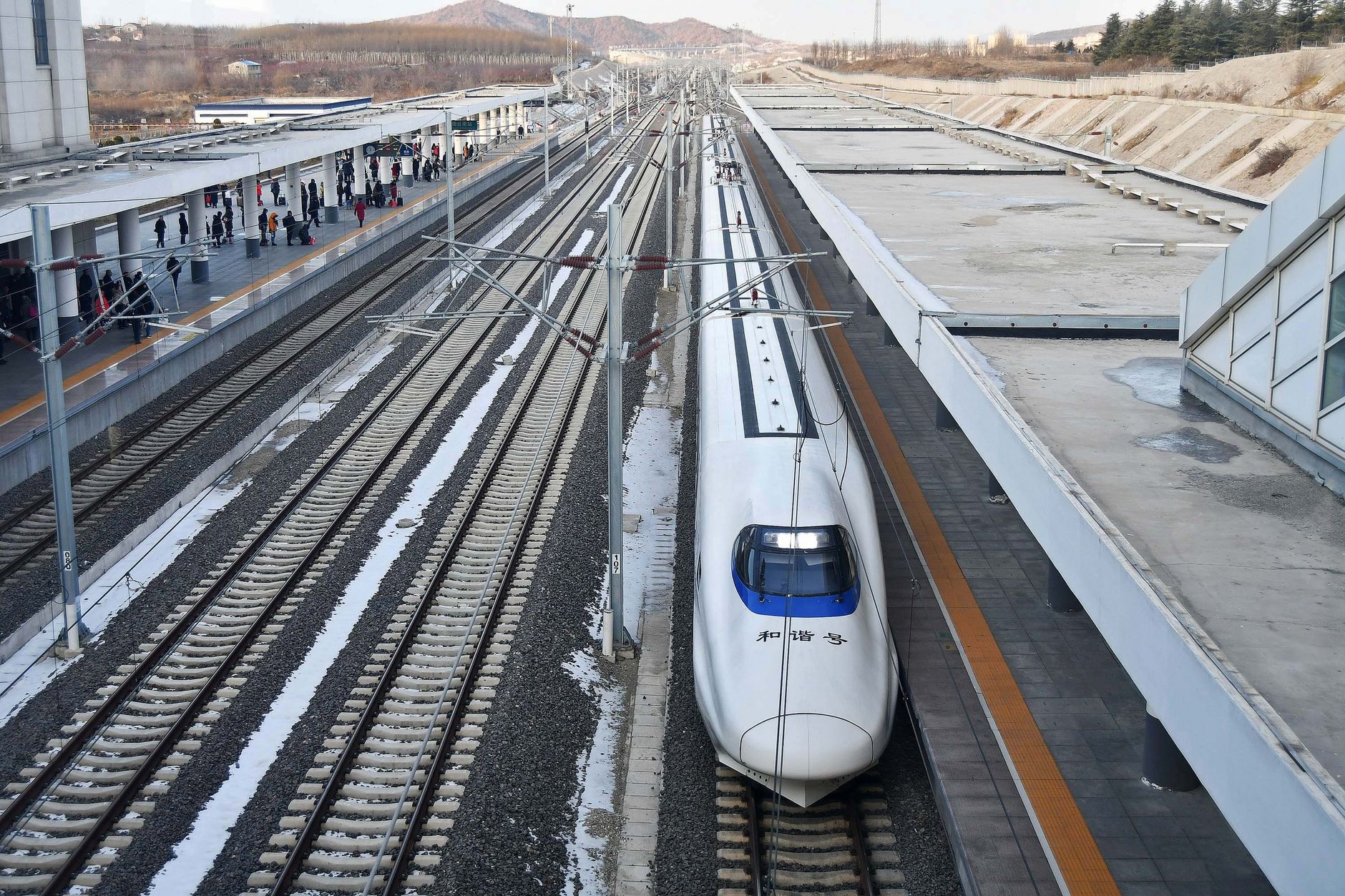 Changchun Longjia Airport high-speed rail network Jilin expressway winter train — Photo by Greece-China News