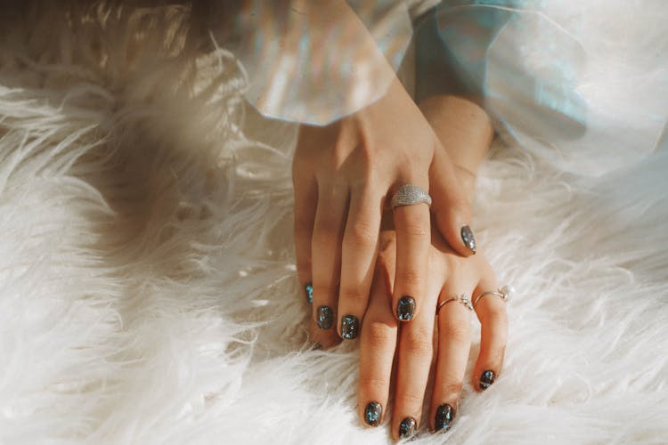 Womans Hand Wearing Jewelry 