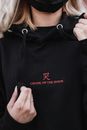 Woman in Black and Red Pullover Hoodie