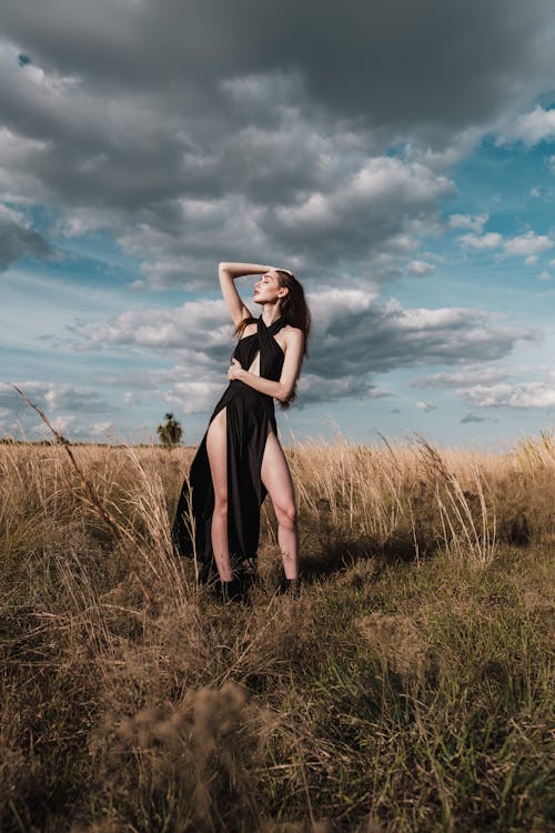 A Woman Posing in the Field