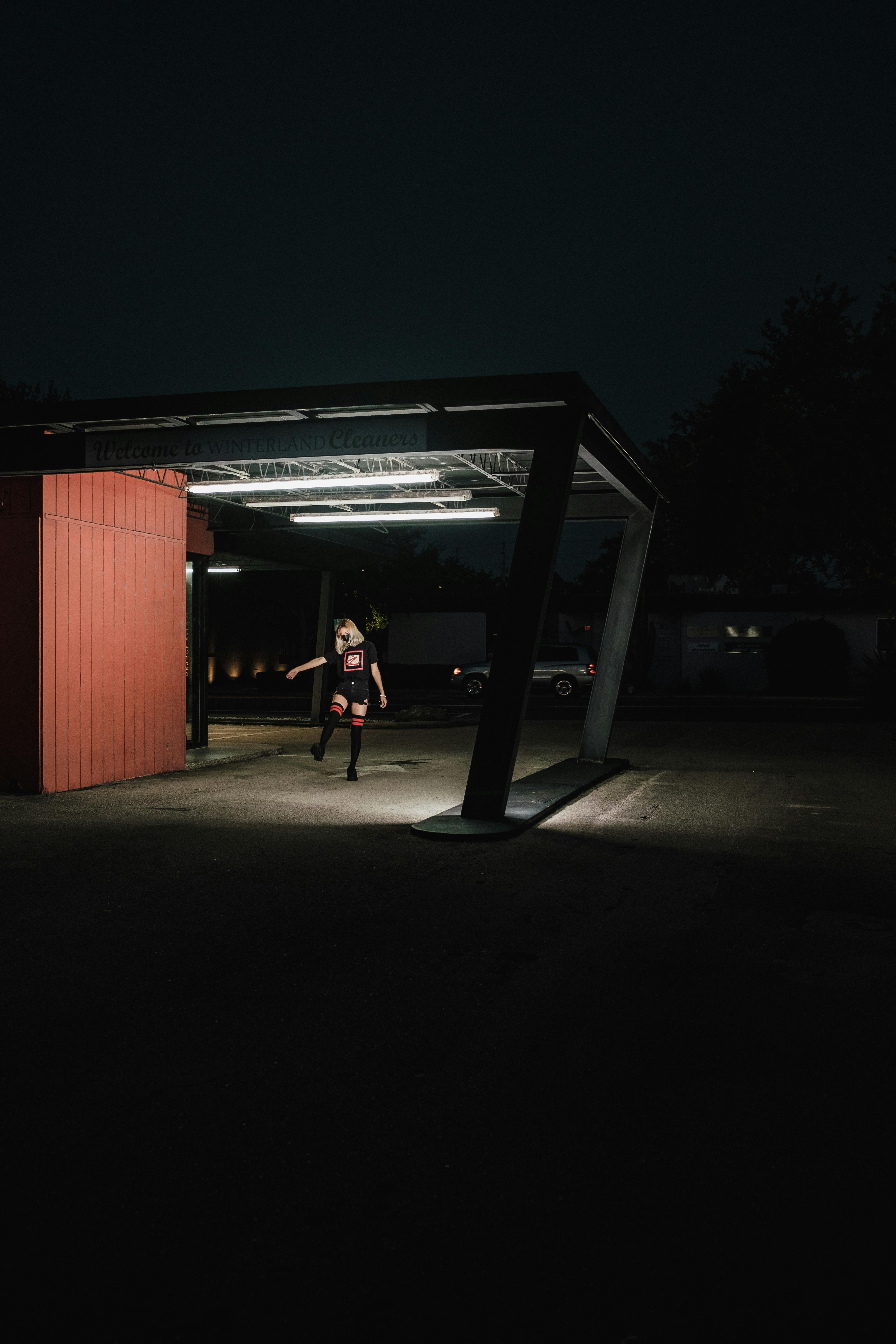 woman walking at night