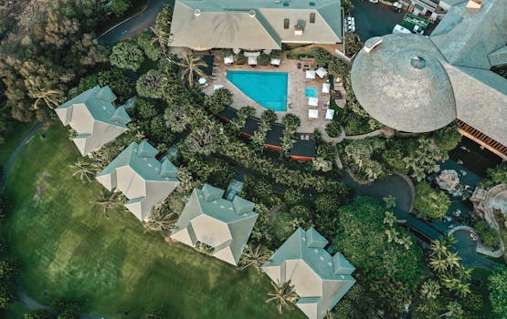A stunning aerial shot capturing a luxurious tropical resort in Wailea-Makena, Hawaii.