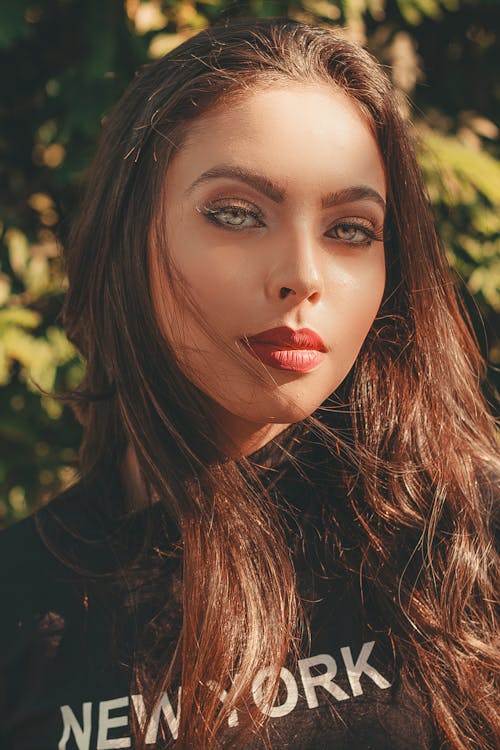 Brown Eyed Woman Wearing Red Lipstick 