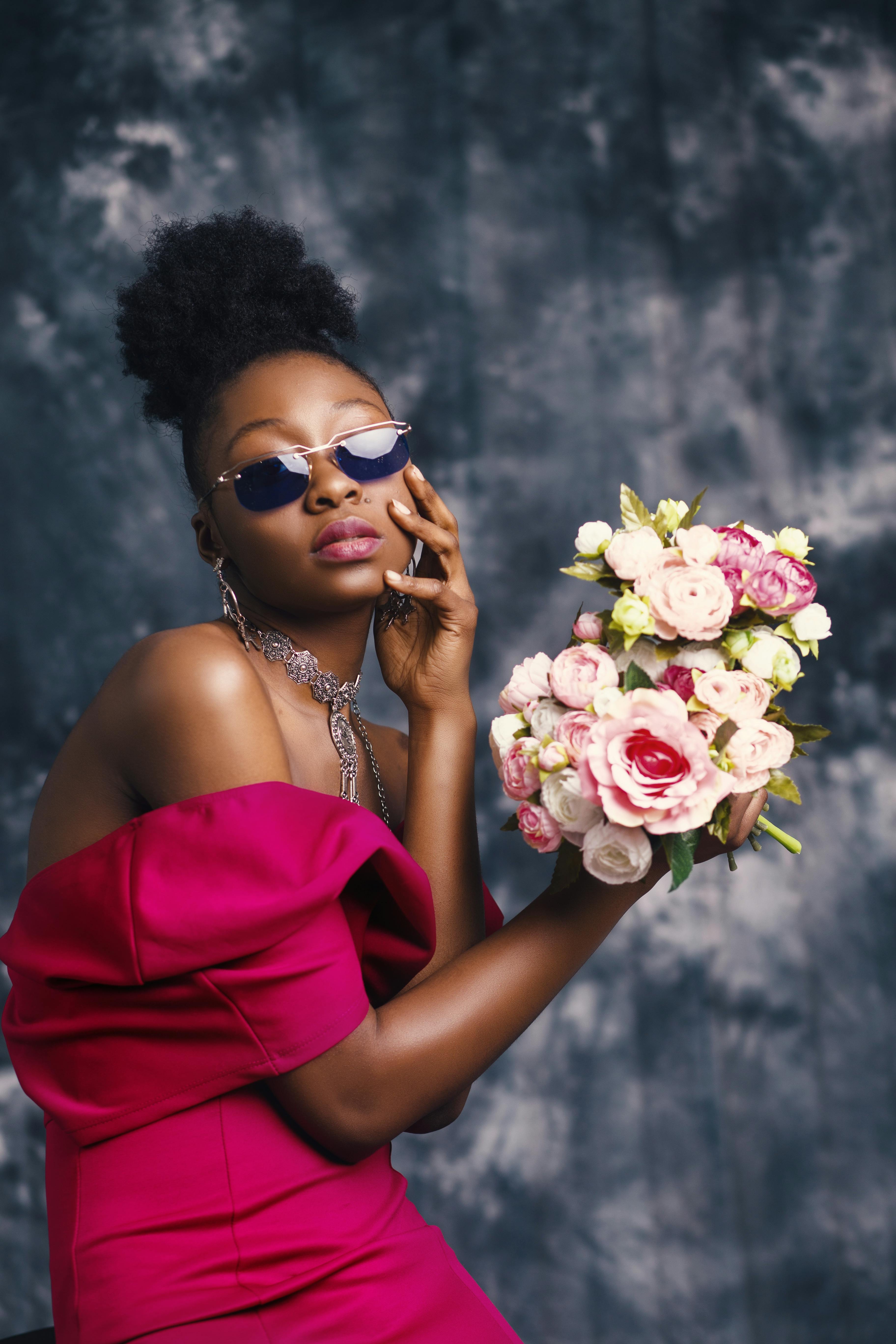 White dress with pink and 2024 blue flowers