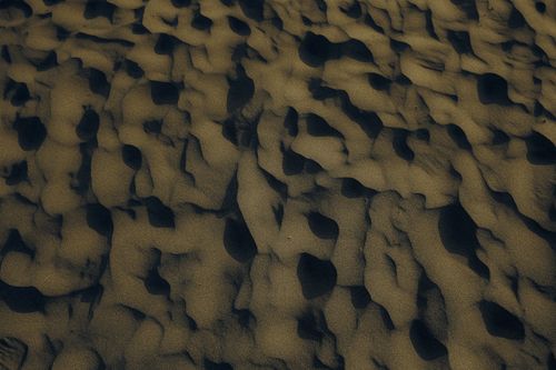 Archive folder cover: aerial sand patterns on a beach — Atahan Demir on Pexels