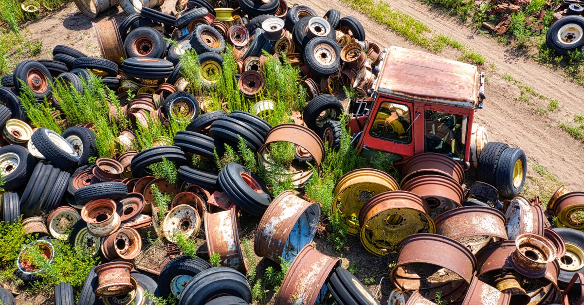 An Aerial Shot of Rims and Tires at a Junkyard · Free Stock Photo
