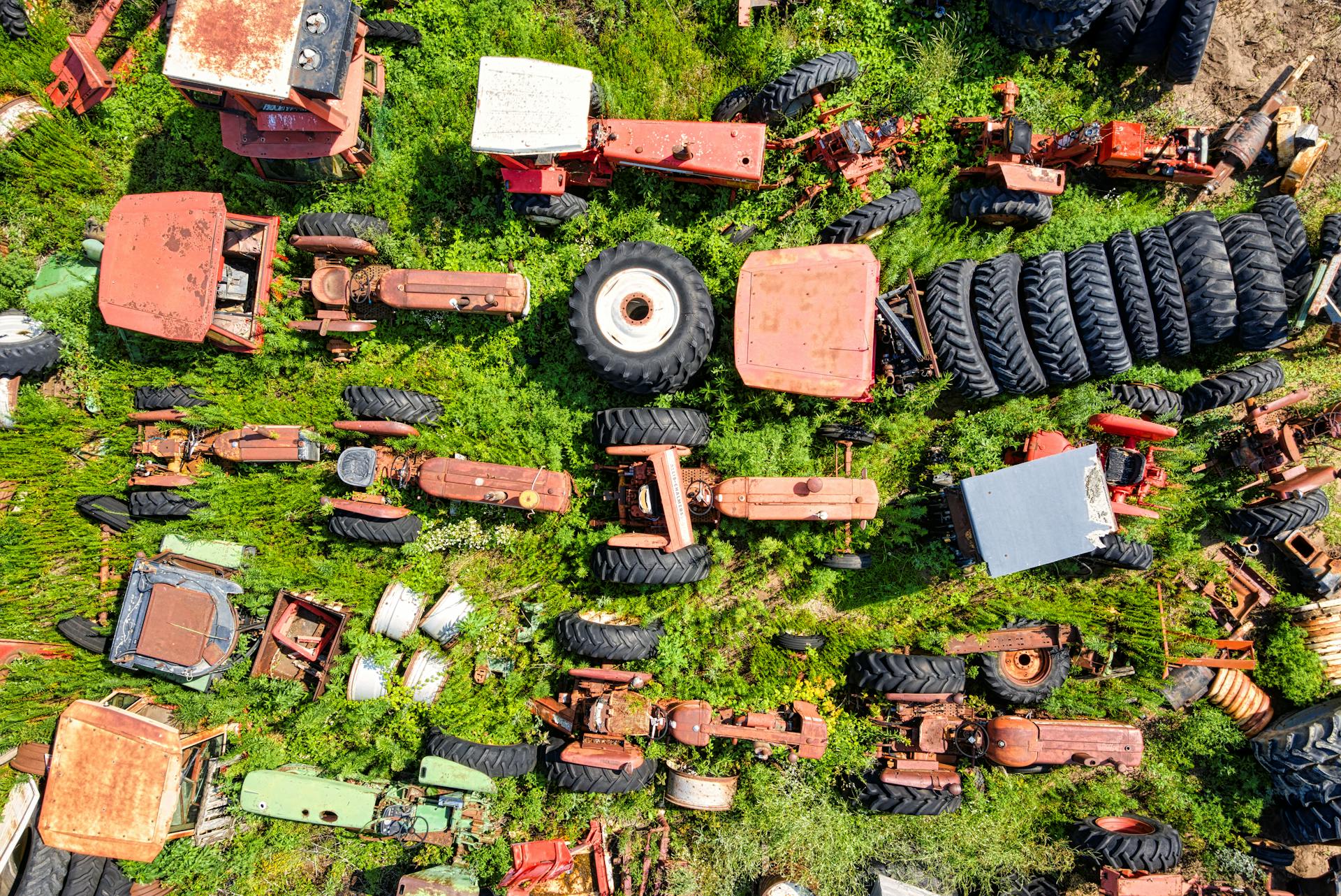 An Aerial Shot of Tractor Parts at a Junkyard