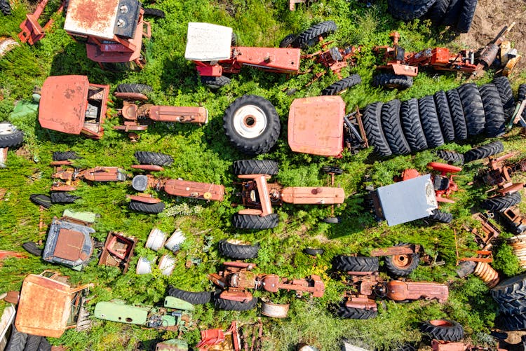 An Aerial Shot Of Tractor Parts At A Junkyard