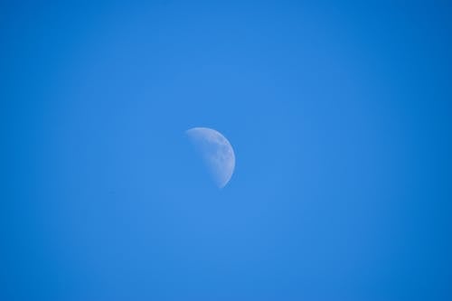 Half Moon in Blue Sky