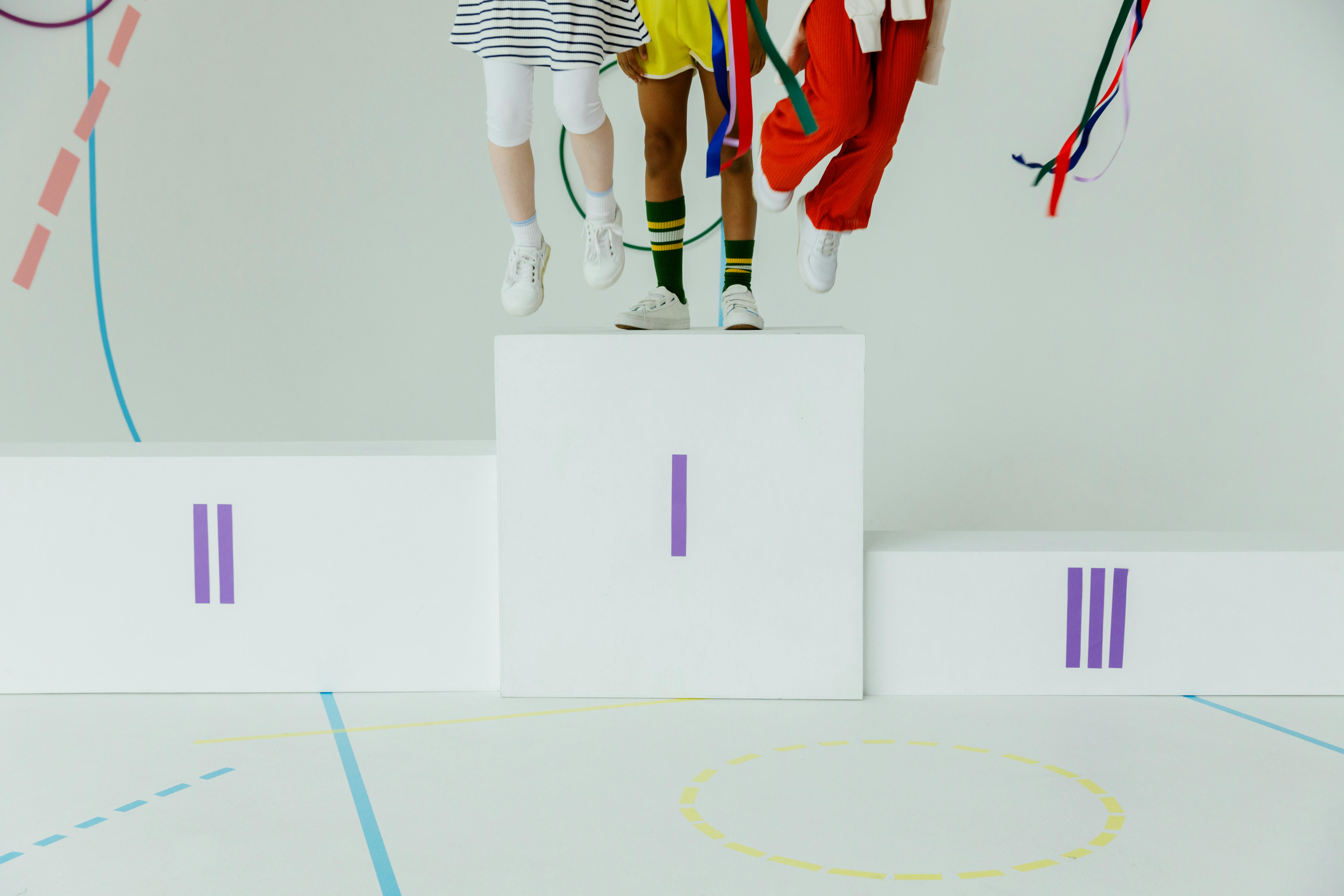 kids standing on a podium