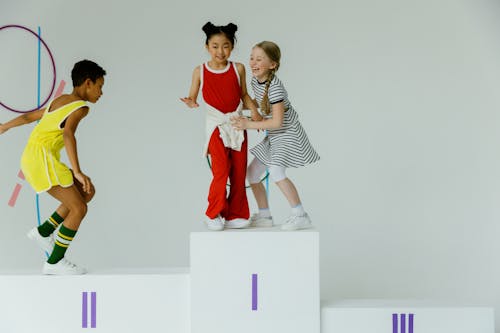 Smiling Girls and Boy on Podium