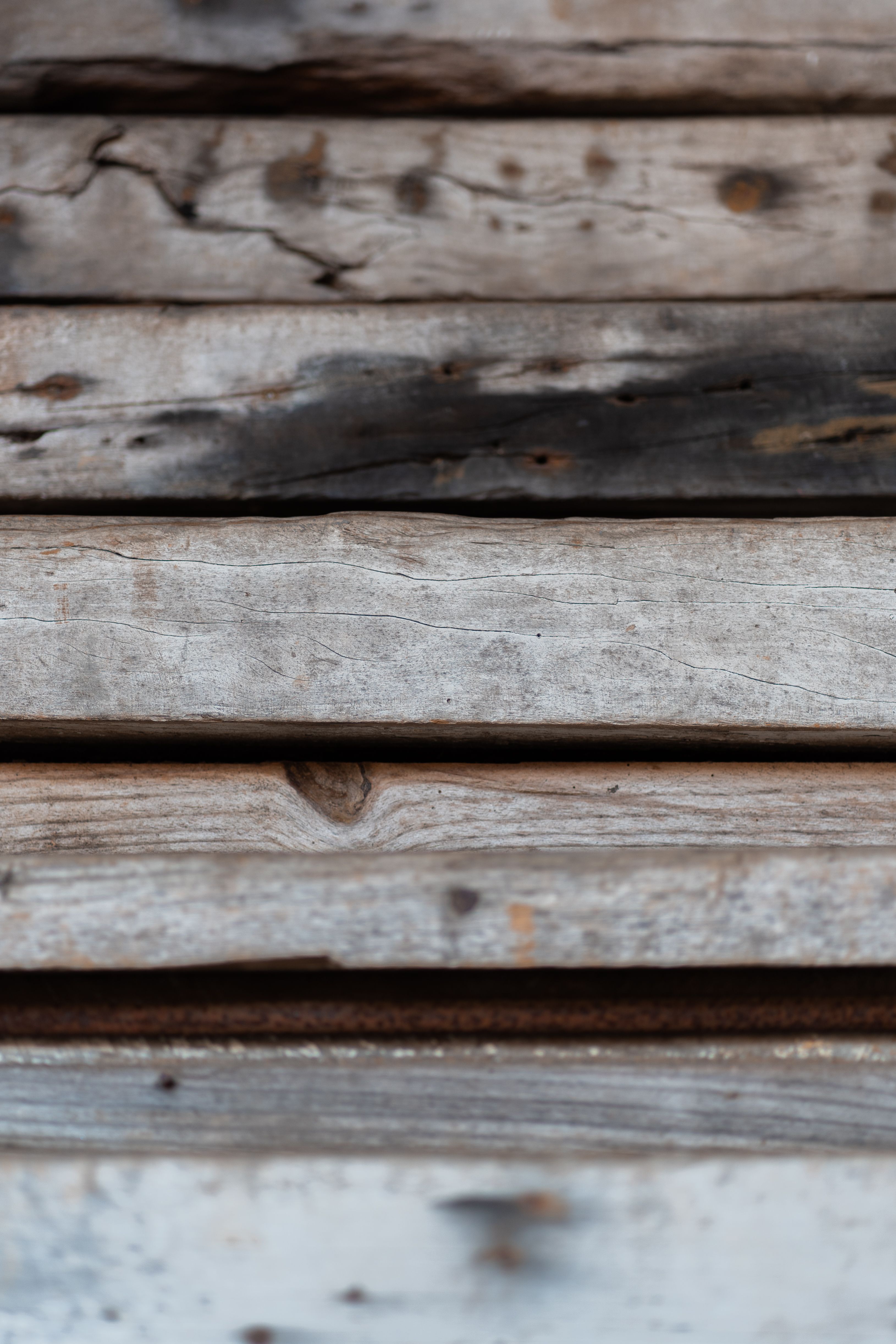 Detailed close-up view of aged wooden planks showcasing natural textures and patterns.