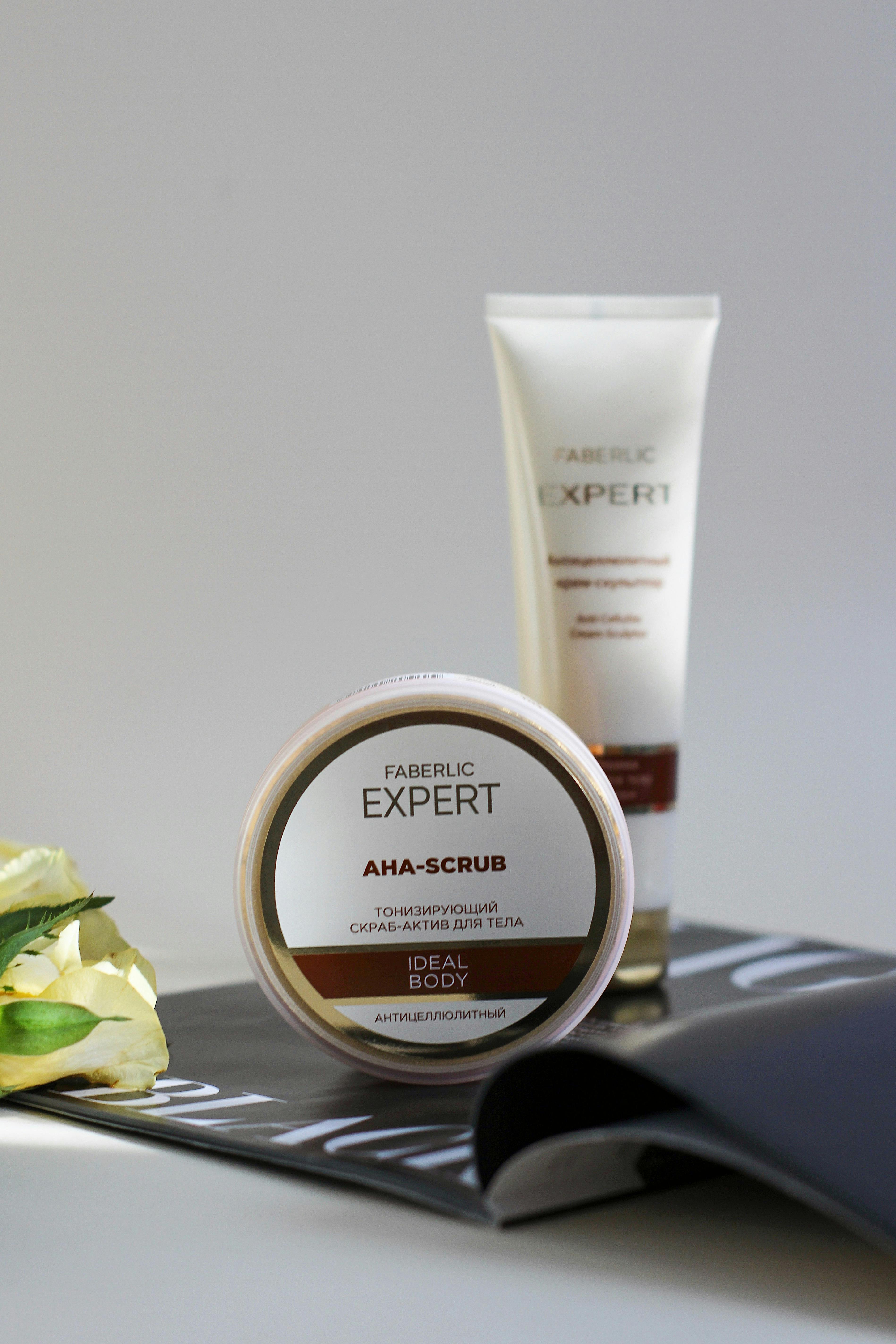 Luxury body care products on a stylish backdrop, highlighting elegance.