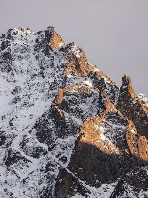 Gratis lagerfoto af lodret skud, Rocky mountain, sne dækket