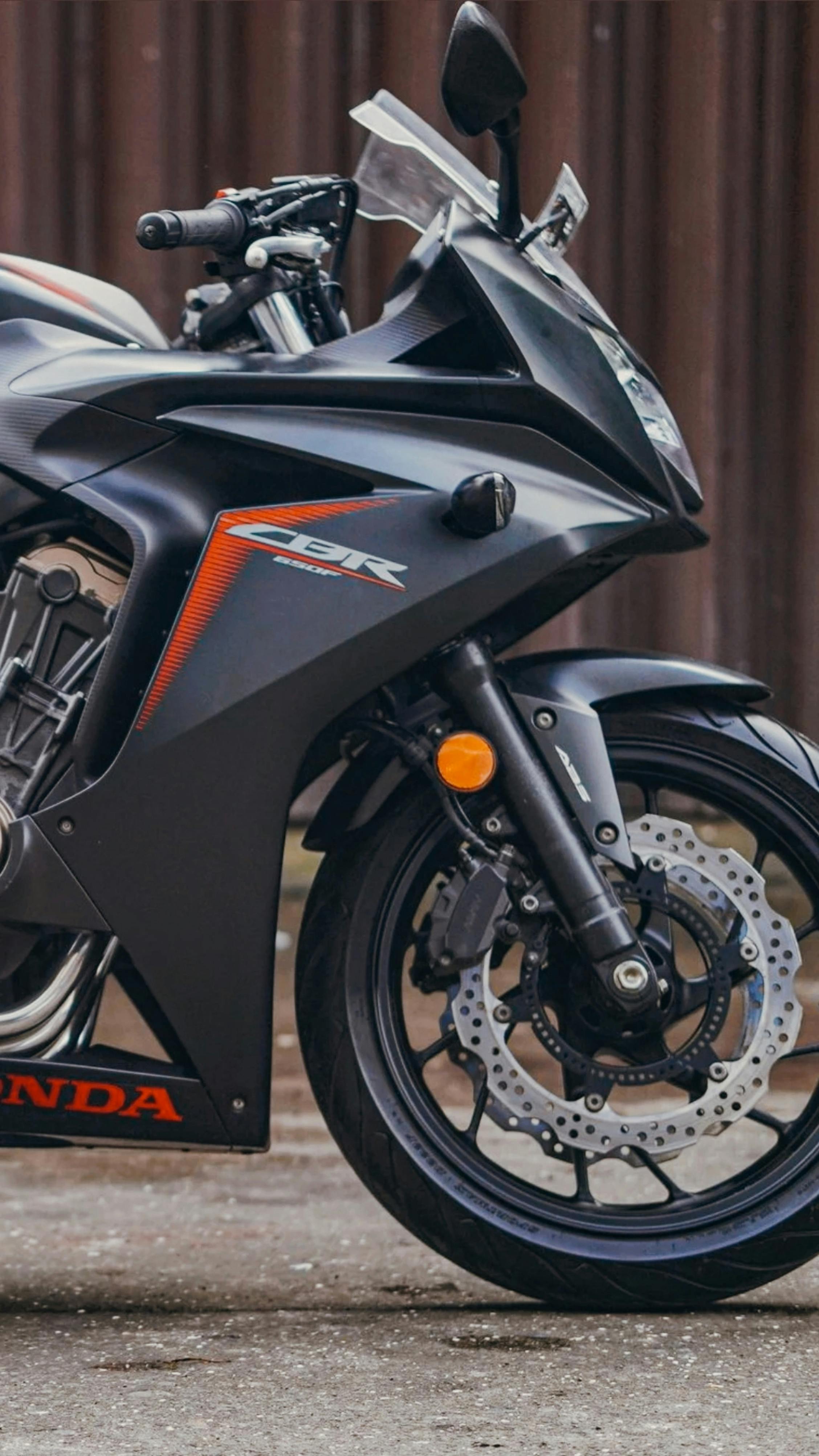 White And Black Cruiser Motorcycle In Middle Of Street Free Stock Photo