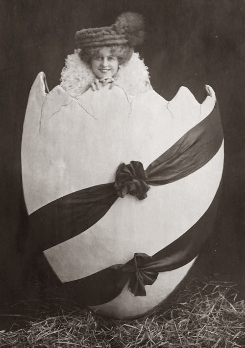 Vintage Photo of Smiling Model Posing in Easter Egg