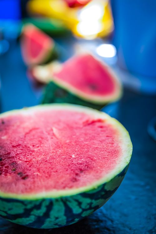 Free Vibrant close-up of a sliced watermelon showcasing its juicy texture on a summer day. Stock Photo