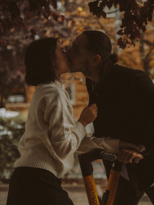 Free Photograph of a Couple Kissing on the Lips Stock Photo