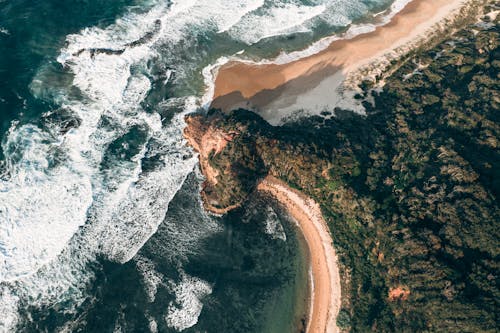 Aerial view on waves on seashore