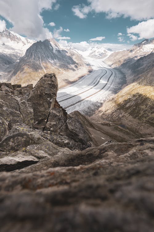 Snowy road in barren mountains