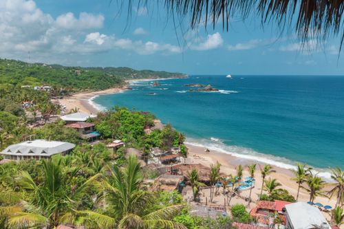 Free A stunning aerial view of Mazunte Beach's coastline in Oaxaca, Mexico. Stock Photo