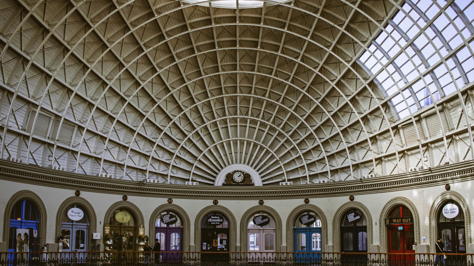 Explore the breathtaking Victorian architecture of Leeds Corn Exchange with its iconic dome and intricate design. A masterpiece in England.