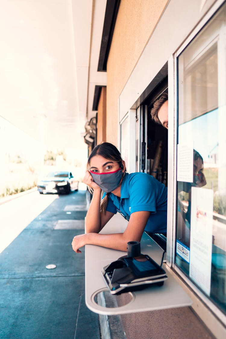 Woman In Fast Food Restaurant Window