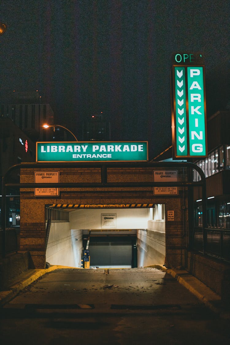 Lighted Entrance To A Basement Parking At Night