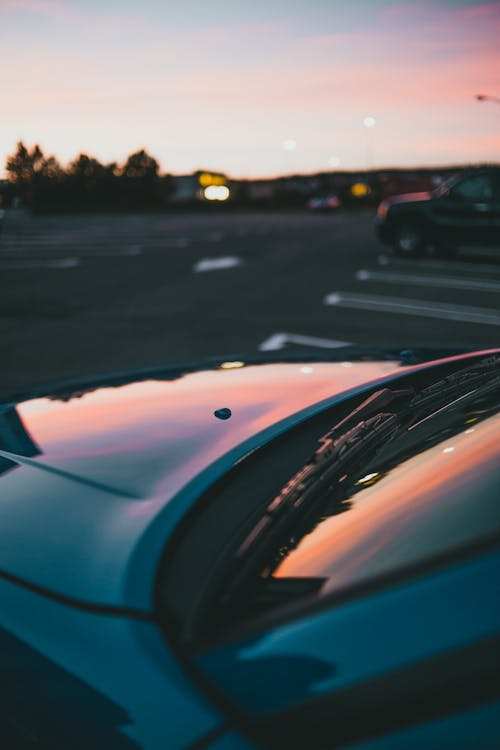 Hood of a Parked Blue Car 