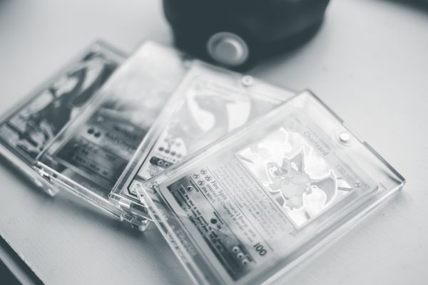 Graded Pokémon cards in protective cases