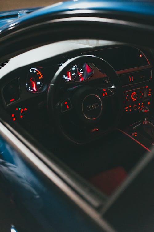 Steering Wheel of a Blue Car