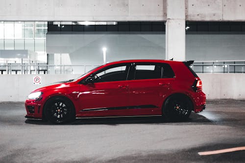 Free Red Sedan Parked on Parking Lot Stock Photo