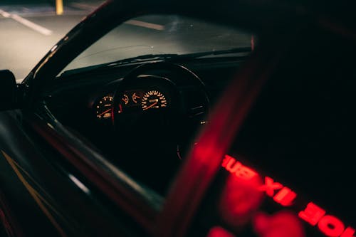 Reflection of a Signage on a Car Window