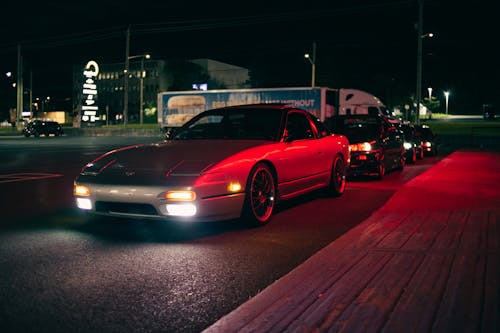 Red Light Shining on Cars