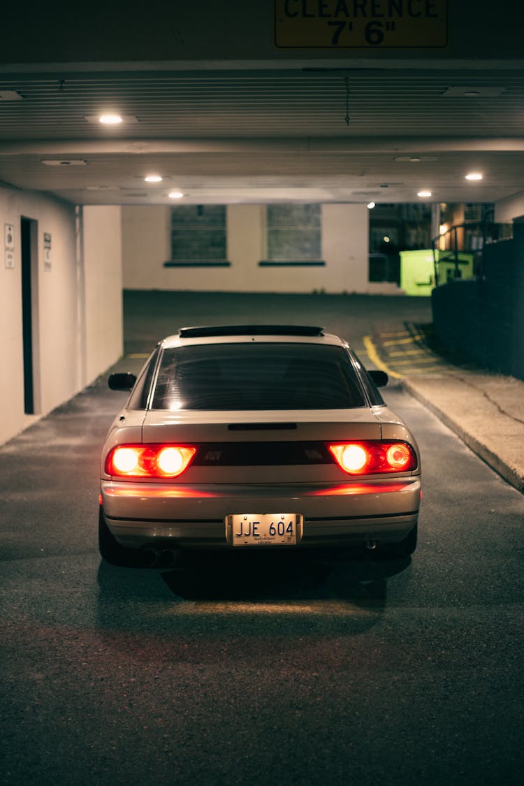 Silver Car Parked On The Driveway